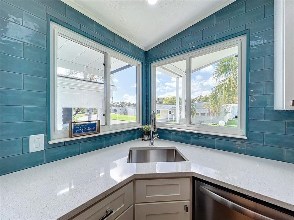 Kitchen sink with corner windows