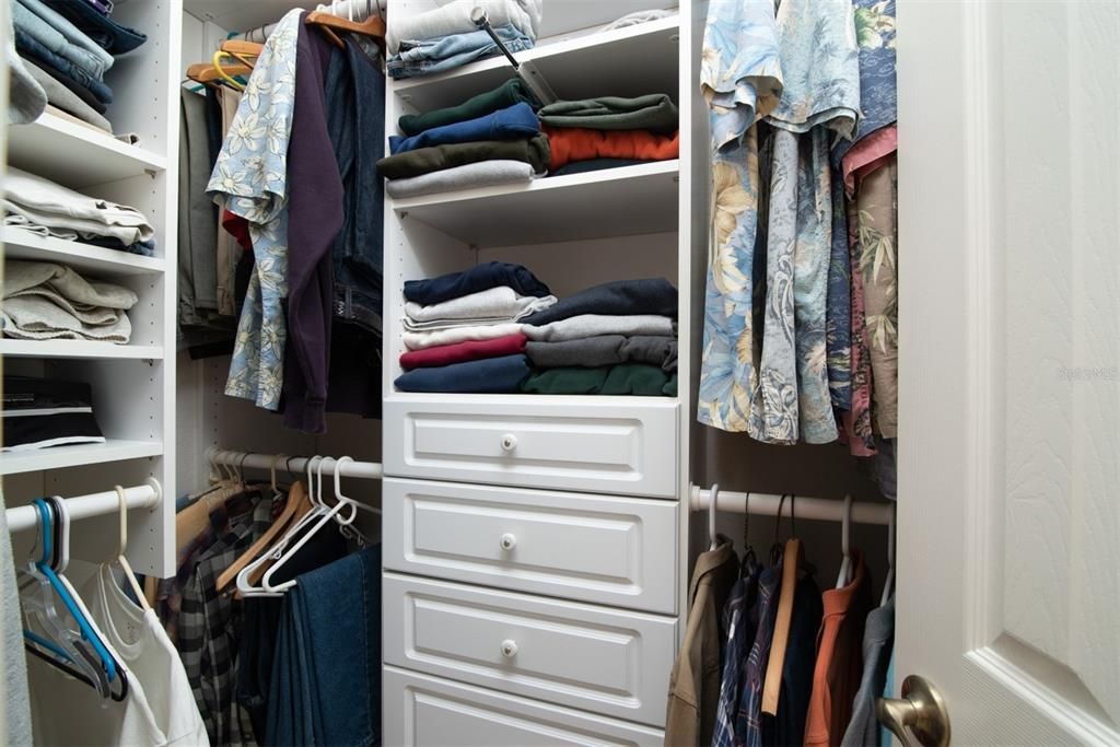 Both of the 2 walk-in closets has a well know company's built-in cabinetry.