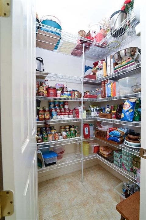 Adjacent to the kitchen is the walk-in pantry!