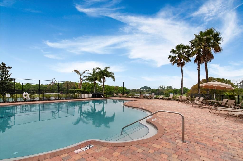 Community pool with outdoor seating