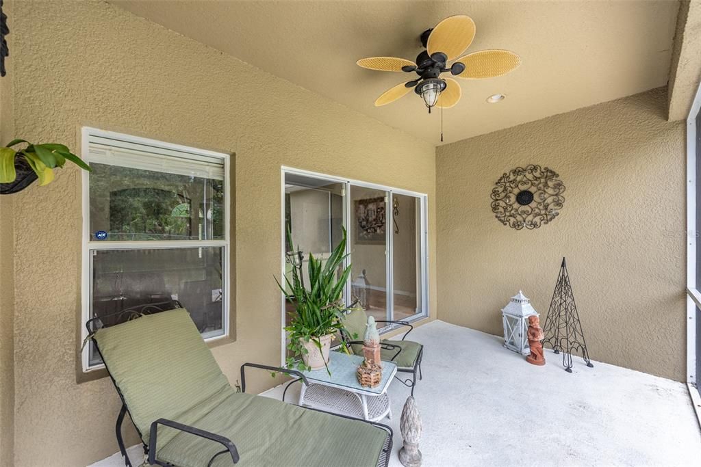 The screened lanai is accessible from the great room and the primary bedroom.