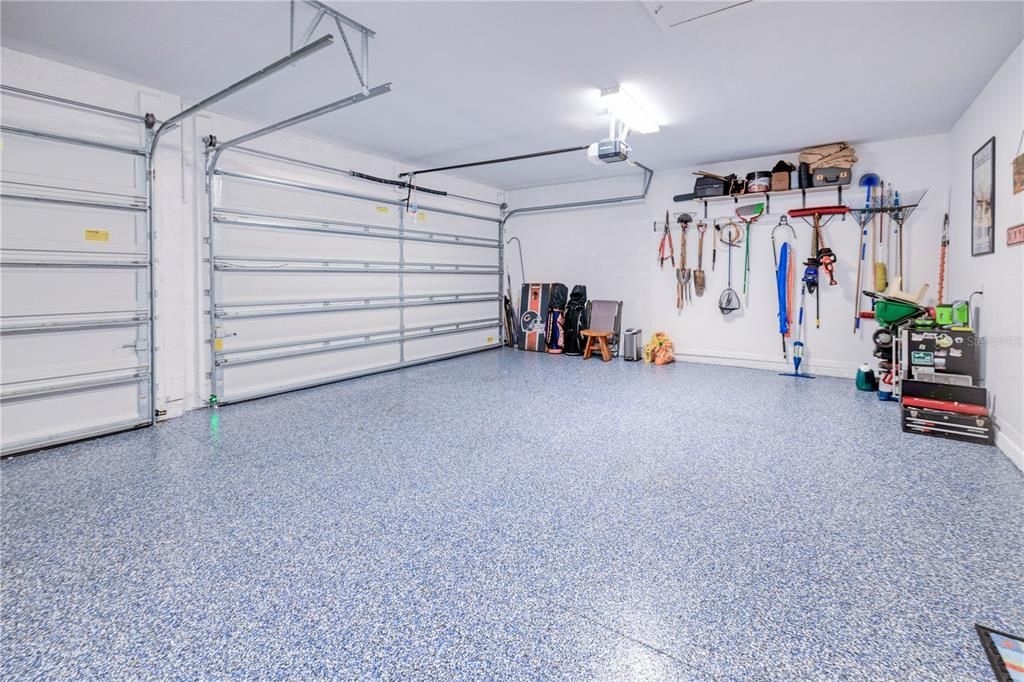 Sought After 3 car garage with Sleek Epoxy finished floor