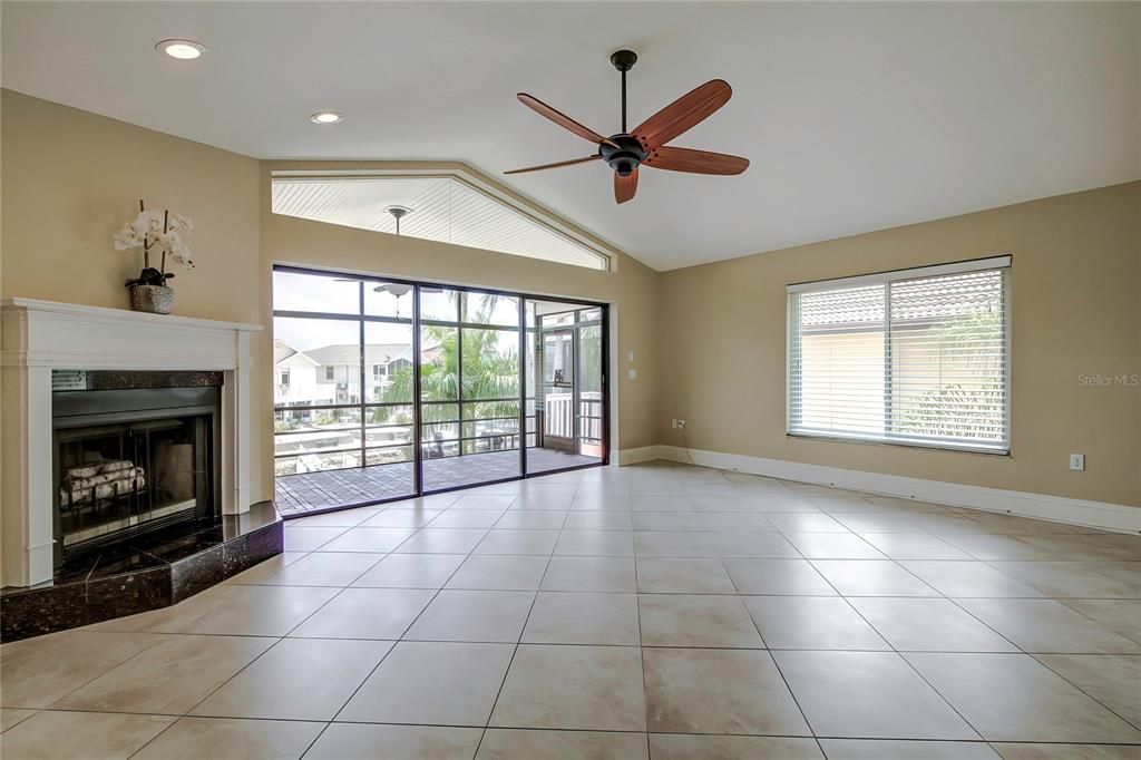 Main living area with working fireplace.