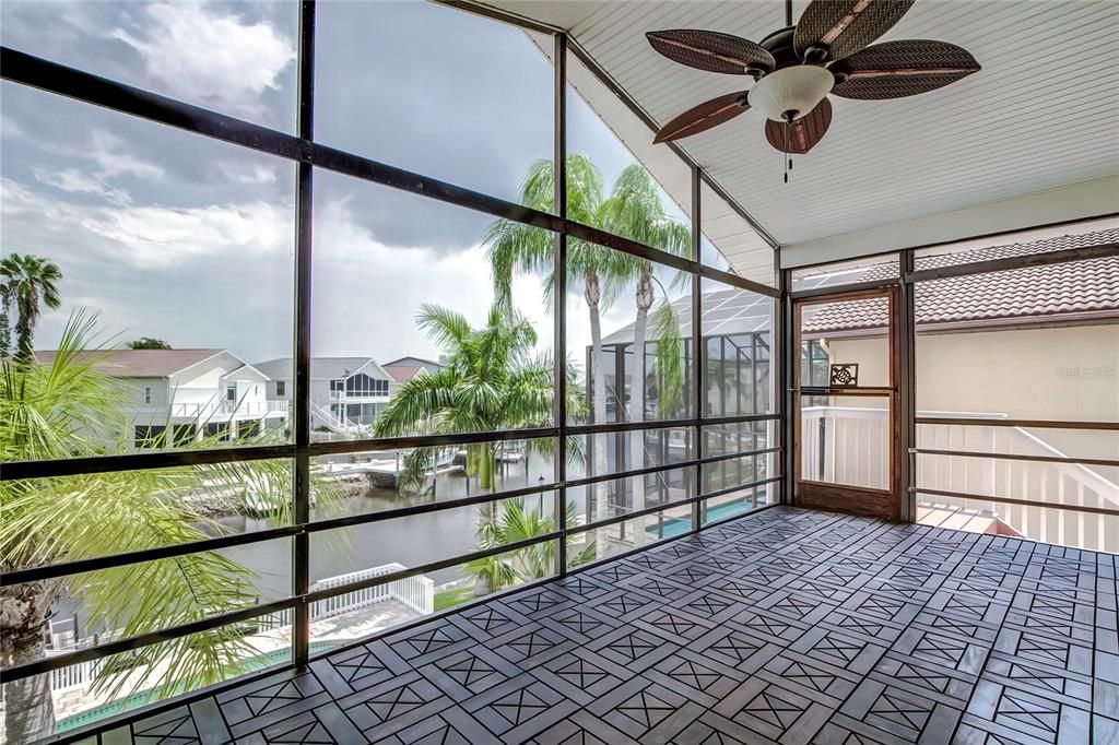 Upstairs screened porch with waterview.