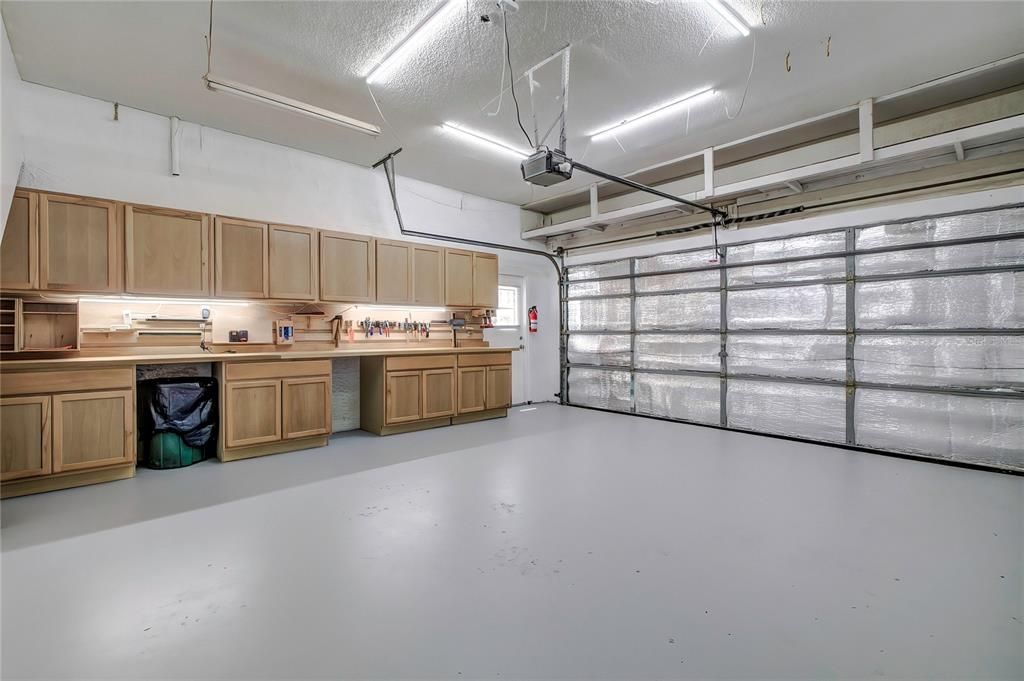 Finished garage with insulated garage door.