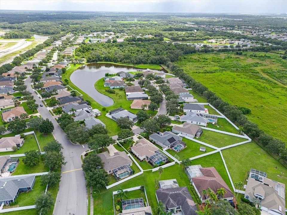 Aerial view of community. Property has a white digital rectangle around it.