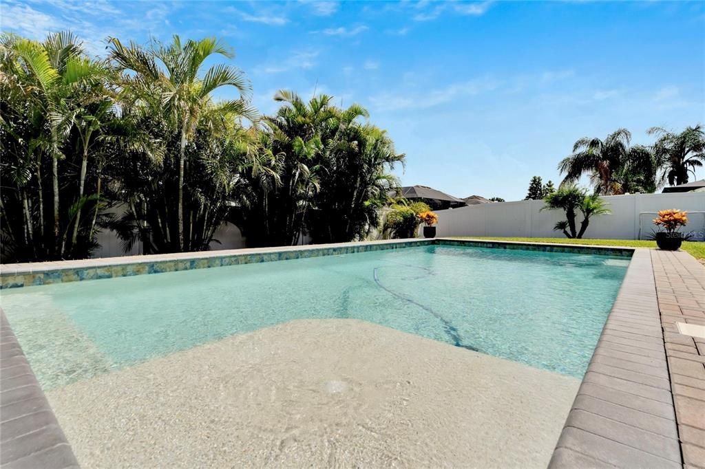 saltwater pool, featuring a pebble tech finish and LED lights