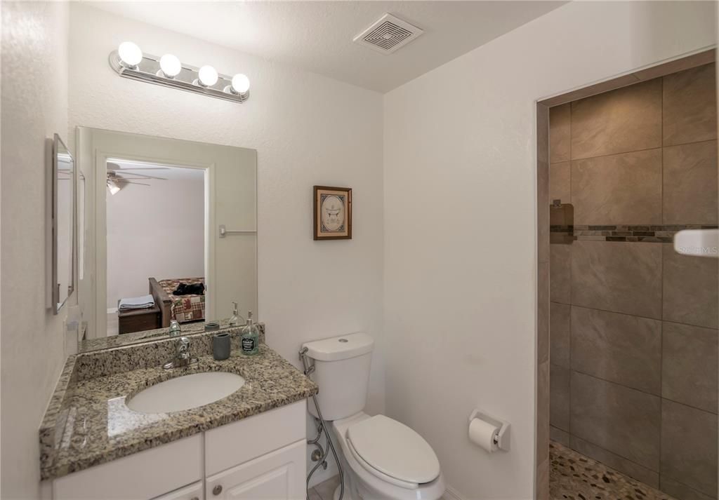 Primary bathroom with walk in shower.