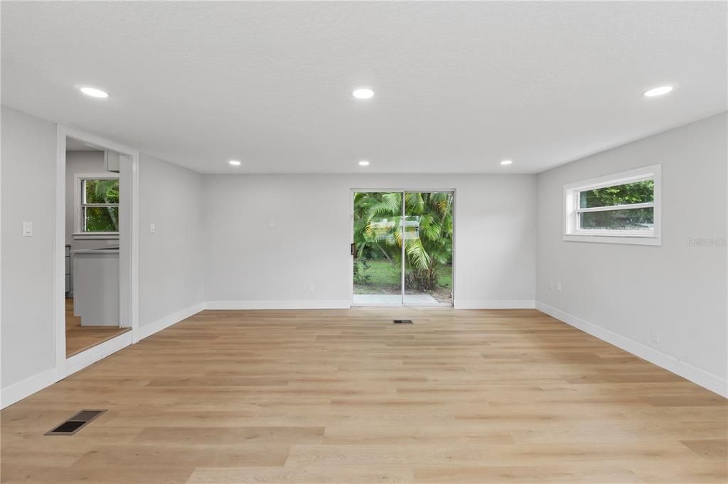 Living room w sliding door to patio