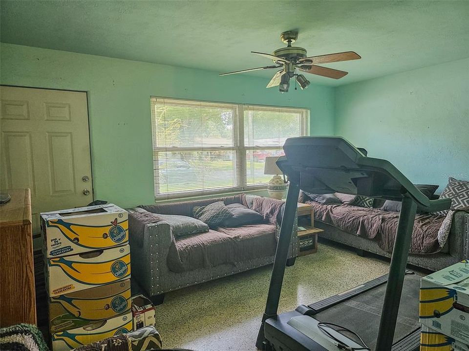 Living room is just in front of the kitchen area