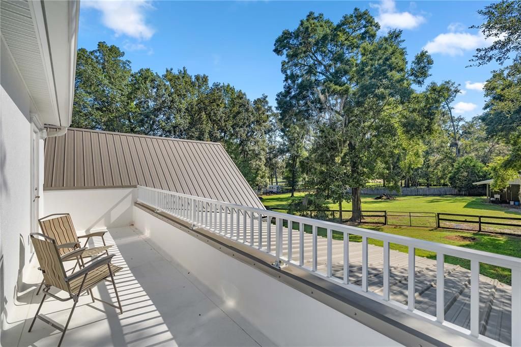 upper deck overlooking back of property and barn