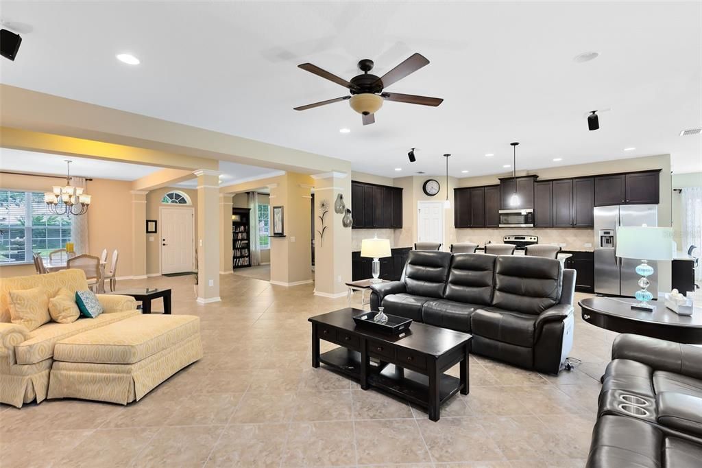 The heart of the home is the expansive family room and kitchen combo, designed for effortless entertaining.