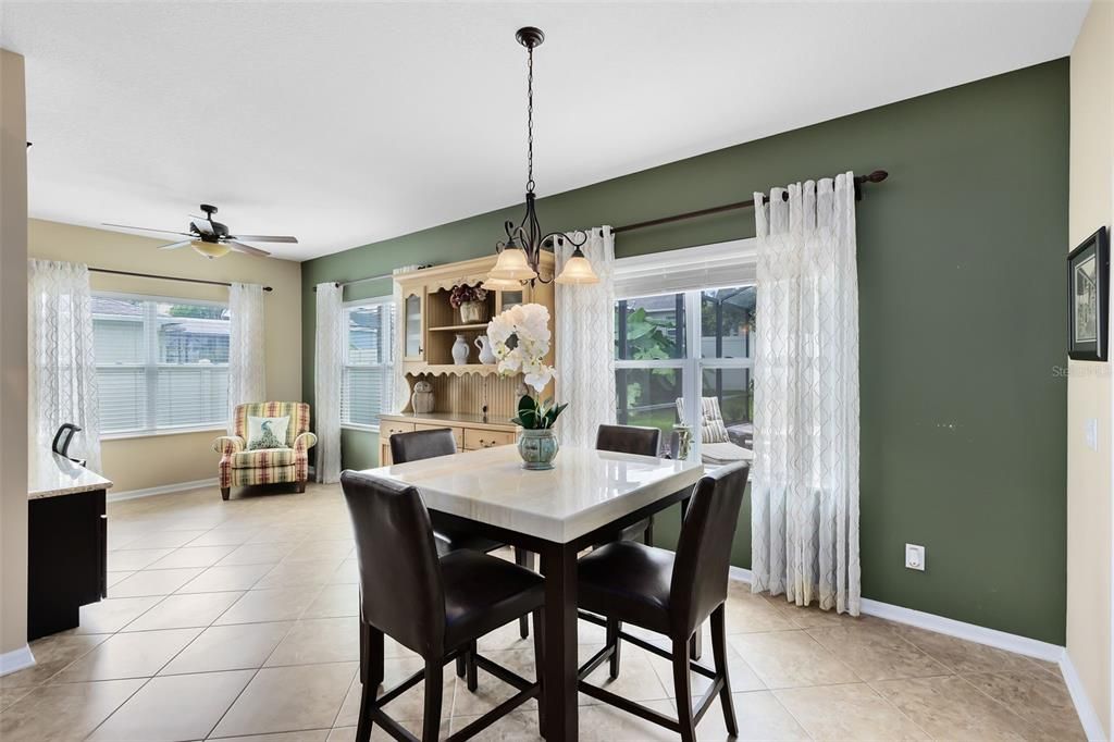 Adjacent to the kitchen, a cozy dinette area.