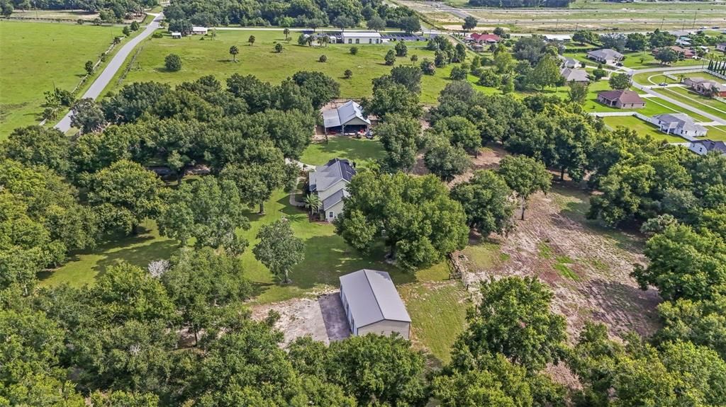 The tranquility of this property is second to none, watch the sunset from the front porch, enjoy the lake views and nearby boat ramp access to Little Lake Harris and the Harris chain of lakes!