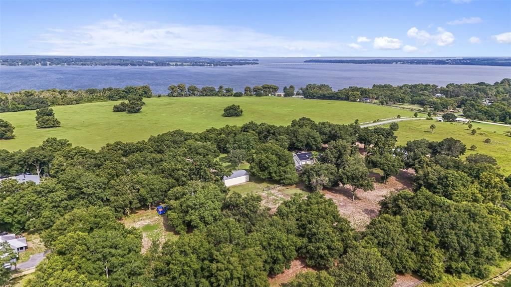 Lake views and lake access complete this 8+ acre property!