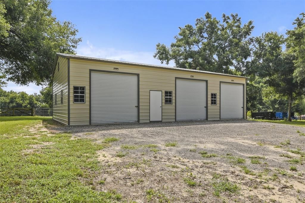 Also on the sprawling acreage there is a 30x50 detached metal garage with an insulated roof versatile to use however you might need as well a barn offering 2 stalls and 4 pens.