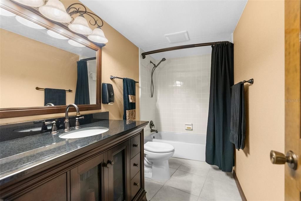 upstairs a remodeled full bathroom with tub/shower combo