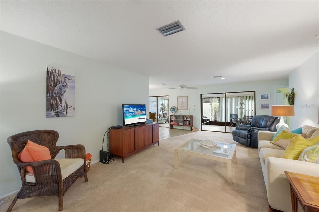 Sliding doors off the living room to the enclosed lanai