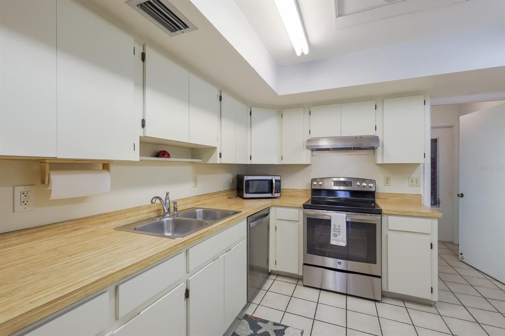 Plenty of counter space and pantry closet in the kitchen