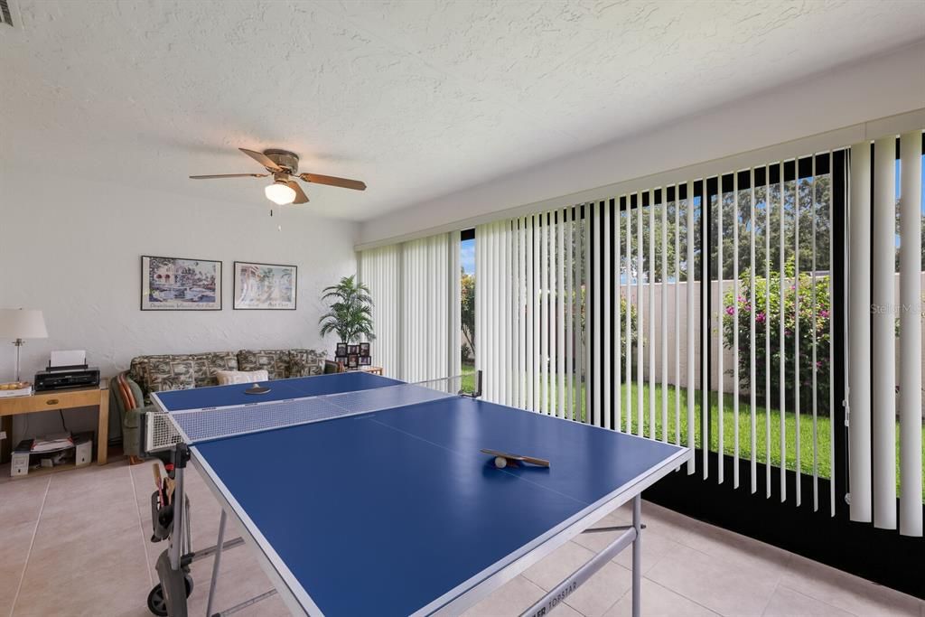 Light and bright lanai makes for an extra room in the villa