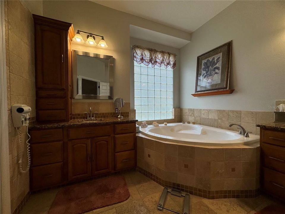 Master Bathroom with His & Hers Vanity, Garden Jacuzzi Tub, and Seperate Shower