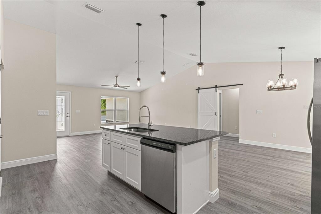 Kitchen island with microwave and sink