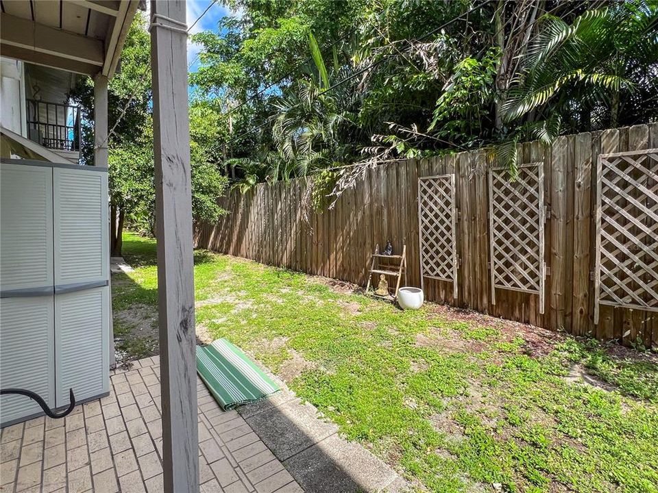 covered back patio with storage