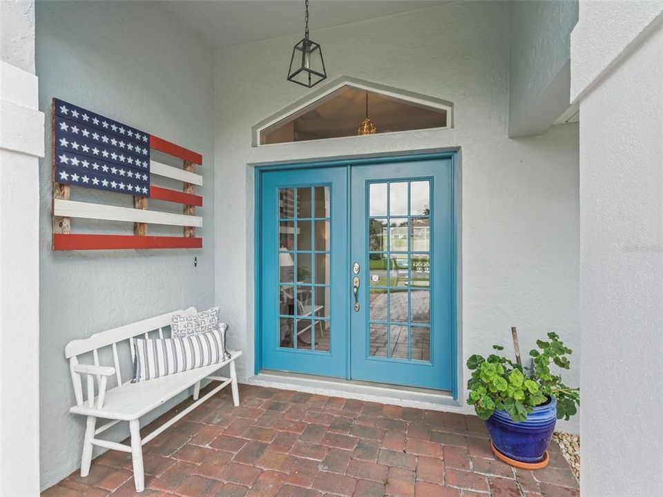 Elegant covered front entrance w/glass double doors!