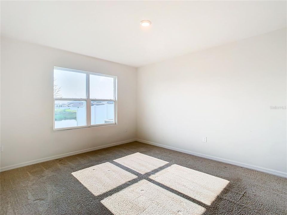 Primary Bedroom. Nice double windows.