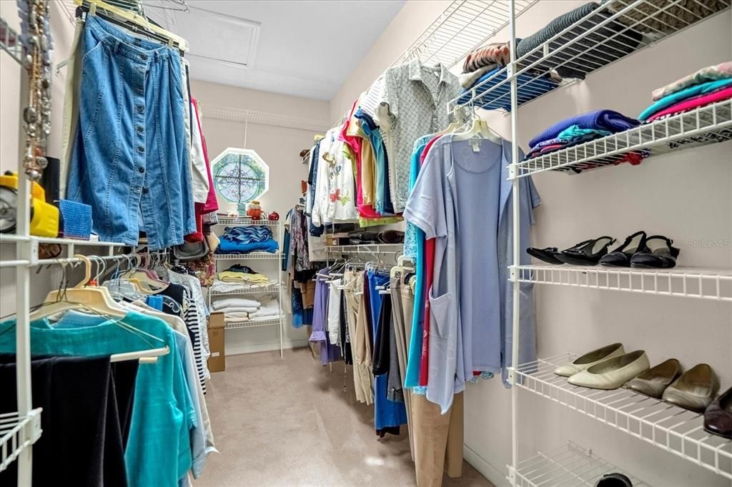 PRIMARY BEDROOM WALK-IN CLOSET, SHELVING, AND STORAGE