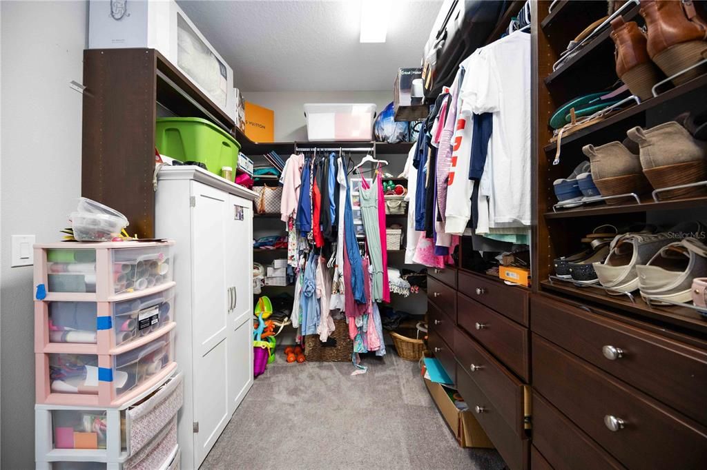 Spacious Primary closet with organizer