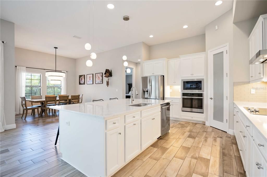 Kitchen with Over sized Quartz Island