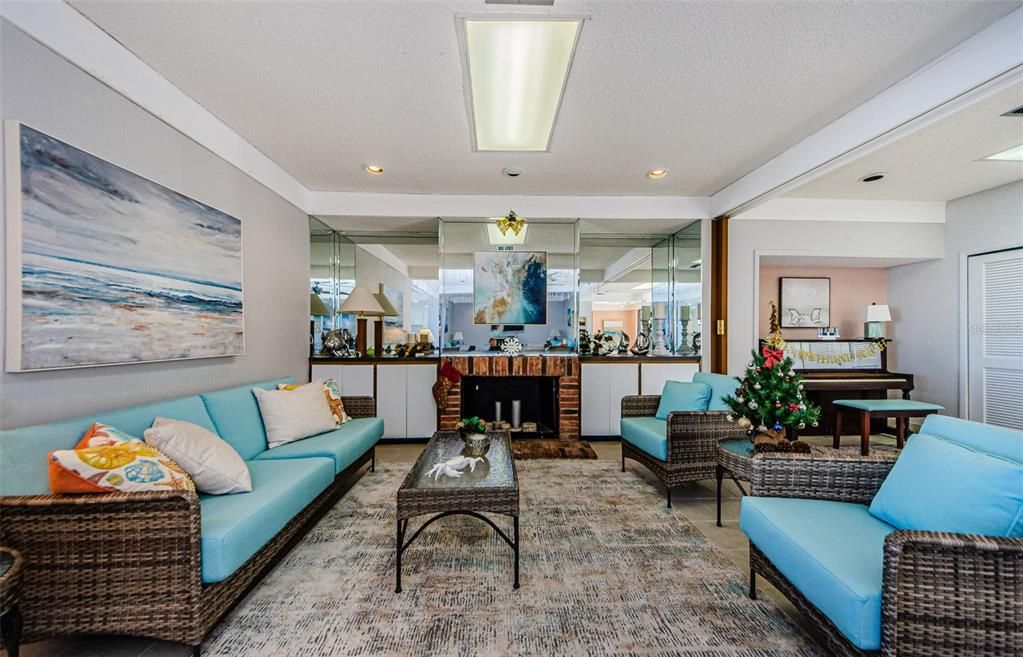 LOUNGE AREA WITH FIREPLACE & PIANO