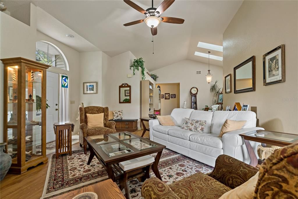 Living Room with Lighted Ceiling Fan