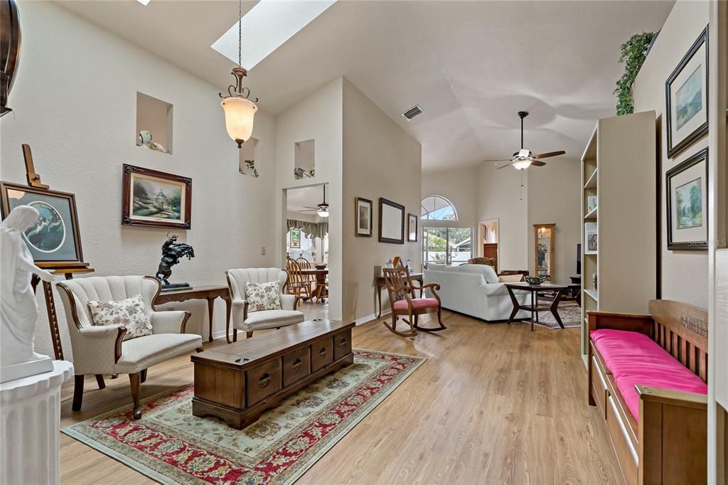 Dining Room Area with Two Skylights and Wood Laminate Floor