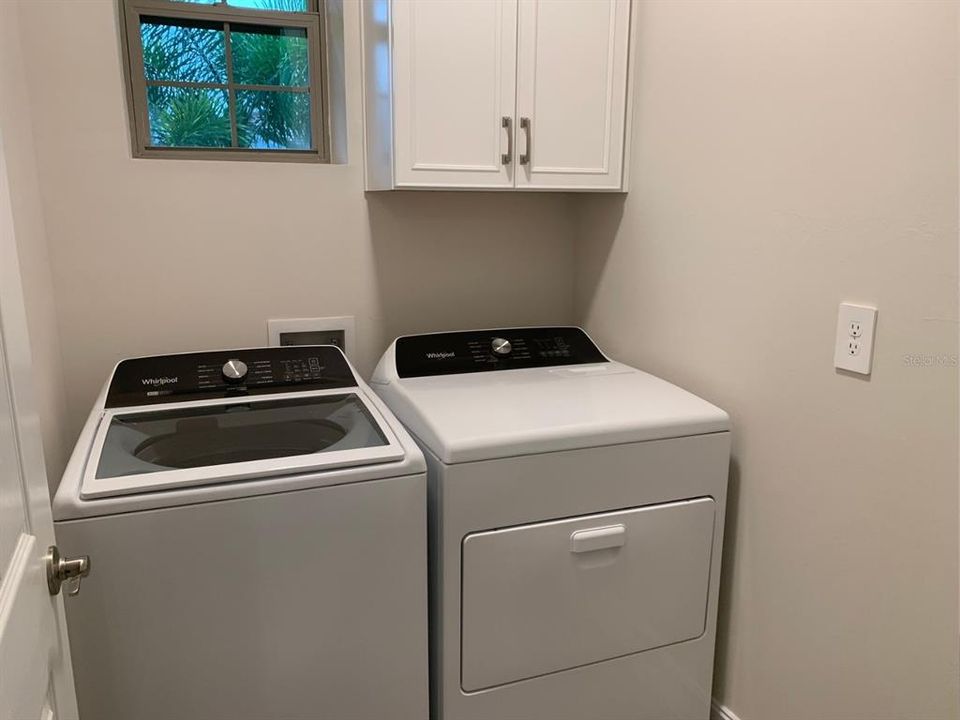 Laundry room with washer and dryer