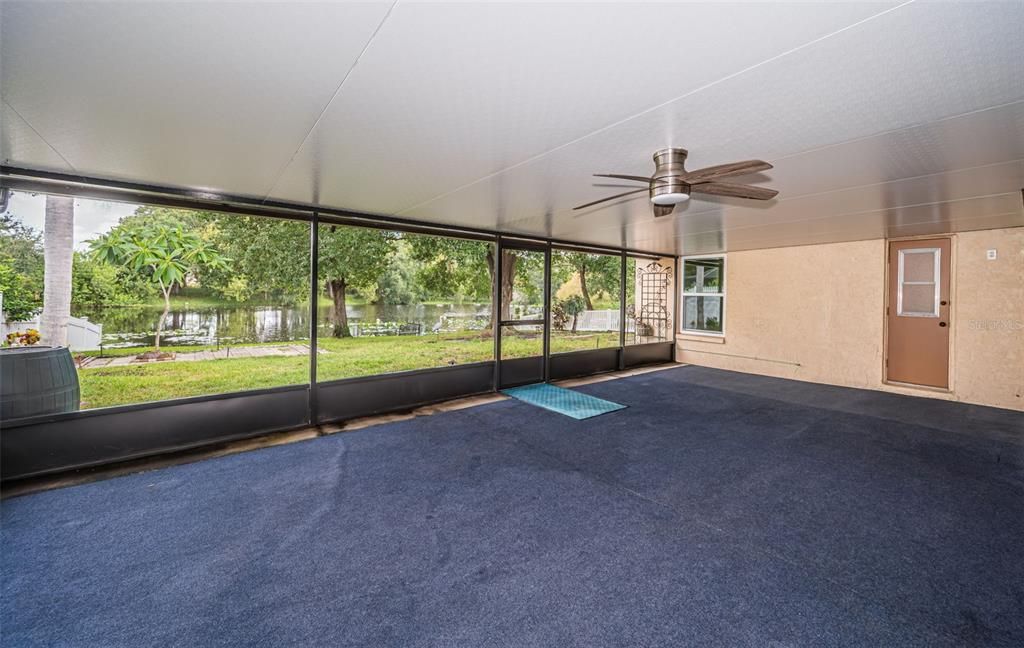 Bath leads out to this screened room.