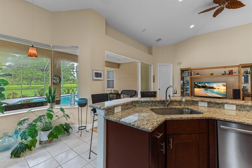 Additional space for an eat-in kitchen nook overlooking the pool