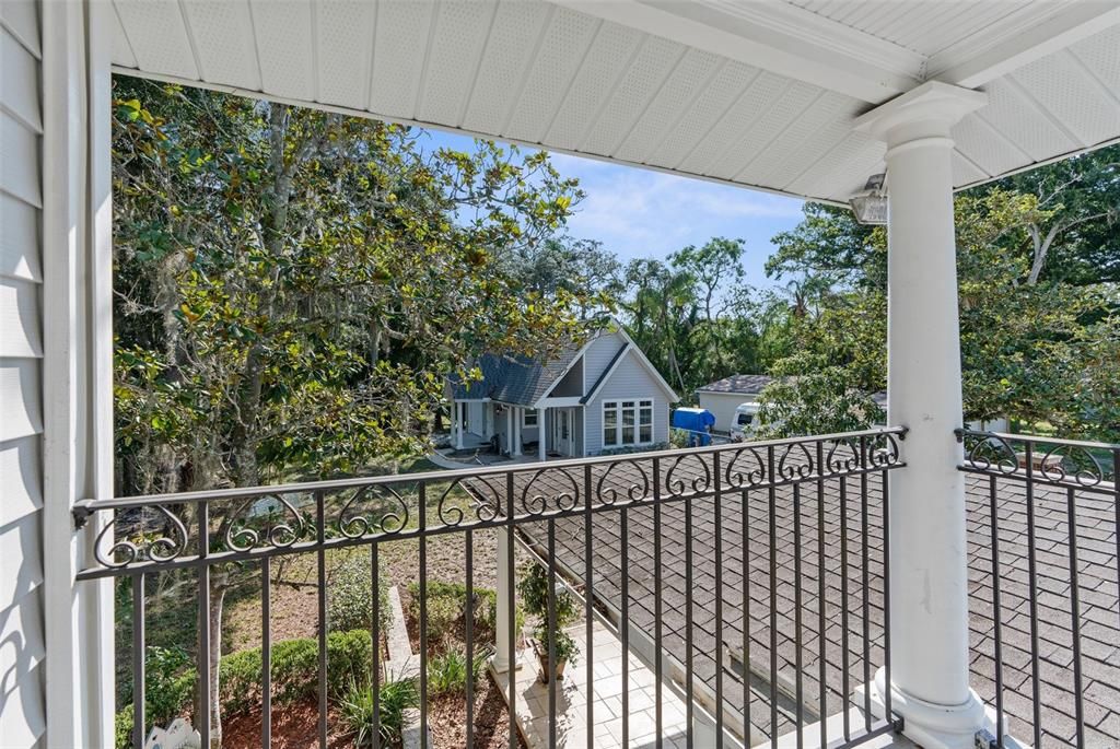 Balcony overlooking the backyard & Guest house