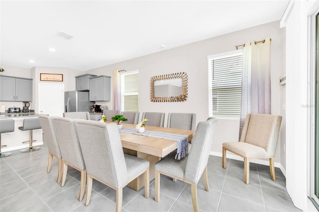 Dining area with sliding doors to Pool and Lanai area