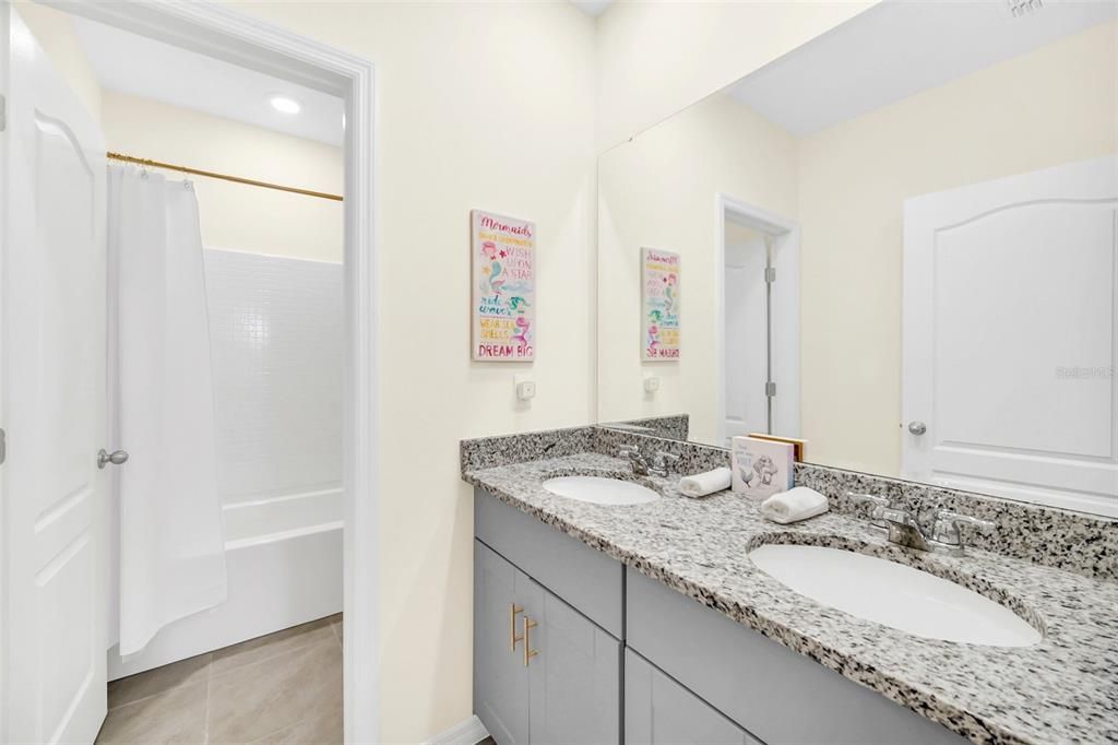 Upstairs Full Bathroom with Shower and Tub