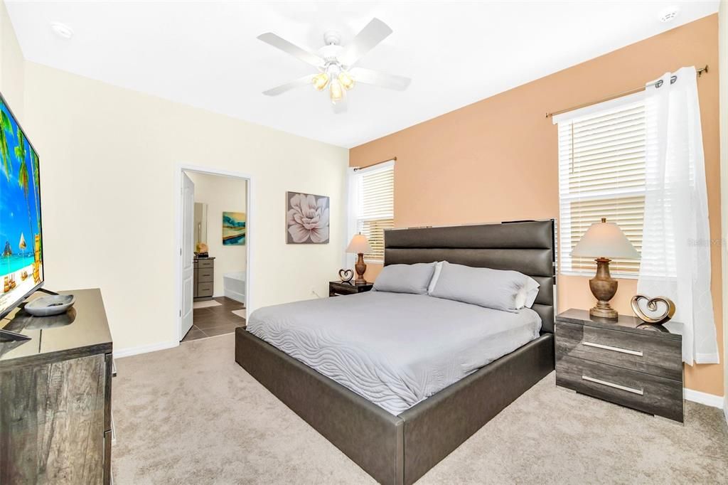 Downstairs Primary Bedroom with King size Bed and en-suite full bathroom