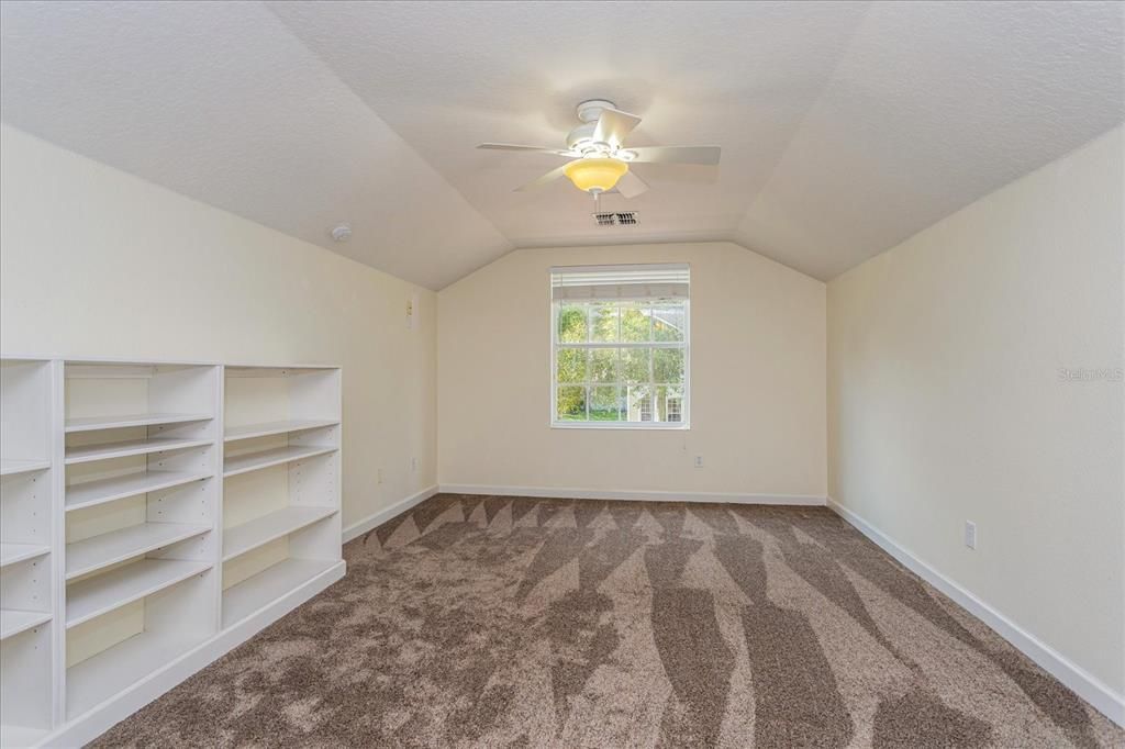 Bonus room with built-in shelving