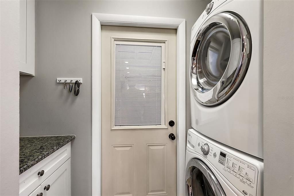 Laundry with storage and countertop