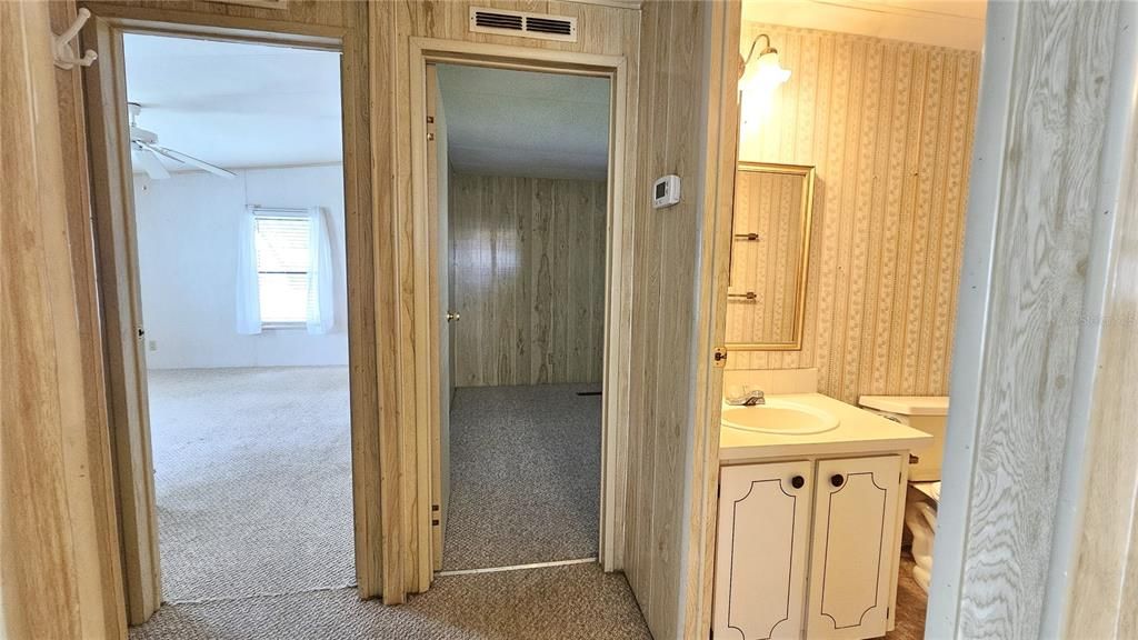 View of 2 Bedrooms & Guest Bath from hallway.