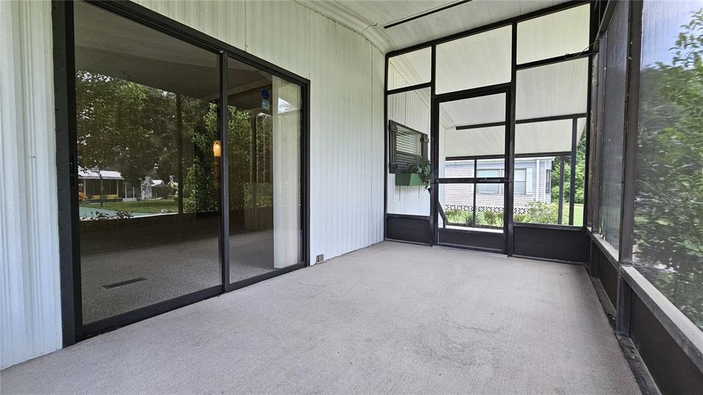 Front porch (Screened & covered roof)