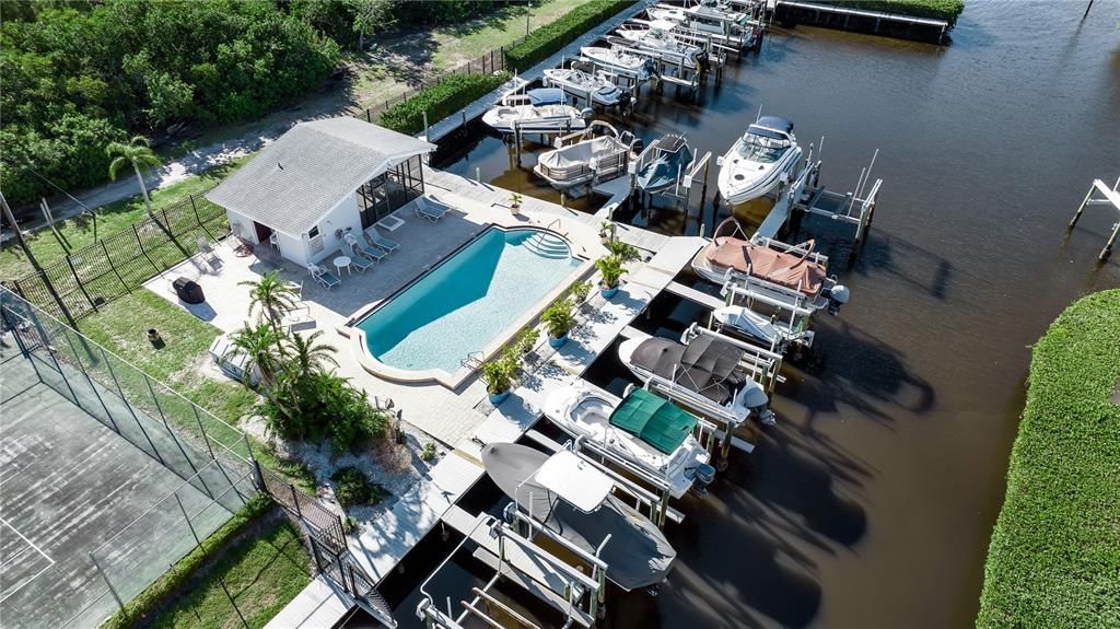 Pontoon with brown cover is the boat slip