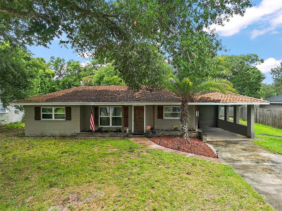 FRONT VIEW WITH LONG DRIVEWAY THAT HOLDS 3 CARS