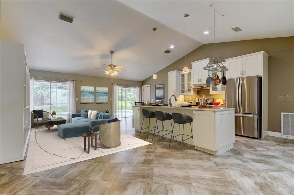 Virtually Staged: More Ways Than You Think at 1st Site on How to Furnish the Living Room! Here is an option if you were to leave the book shelves that flank the center console in place! *SEE the Hanging Pots n Pans Rack?