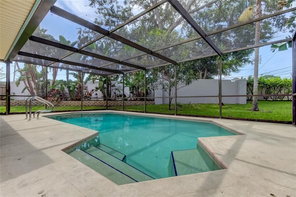 Gorgeous Fun Inground Pool w/ Covered, Screened in Lanai w/Plenty of Covered Areas in the Shade.. w/ Ceiling Fans! You Will LOVE!